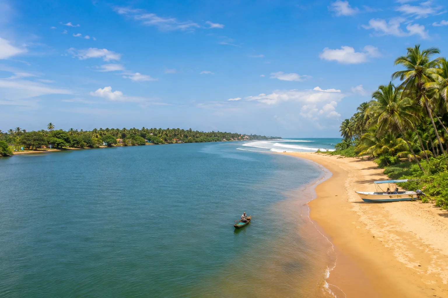 Bentota River meeting the Indian Ocean beside a tropical beach